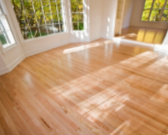 Wood floor surface with polymer applied