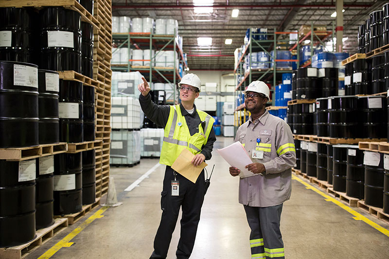 Men in hard hats in a factory