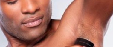 img title Man applying deodorant
