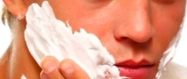 img title Man rubbing on shaving cream