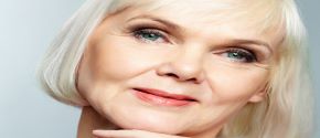 img title Close up of a woman with straight, sleek gray hair