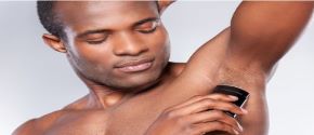 img title Man applying deodorant